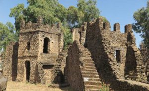 See the remains of Fasil Ghebbi castle on your small group tour to Ethiopia